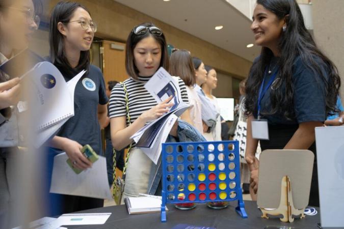 Stanford master's students in the Learning Design and Technology program present their projects at the annual LDT expo. (Photo: Joleen Richards)