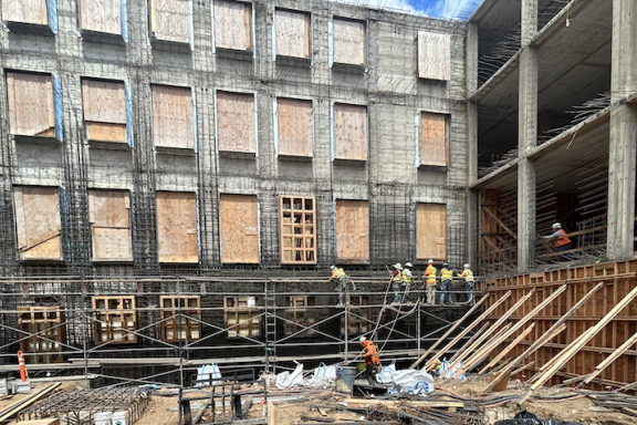 Construction workers shoring up supports for a wall of the historic north building in April 2024. (Photo: McCarthy Building Companies, Inc.)