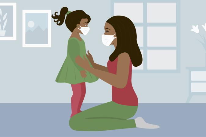 Image of a young girl and her mother with masks on