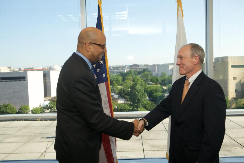 Jim Shelton MA/MBA ’93, deputy secretary of education, swears in Ted Mitchell PhD '83 as under secretary of education.