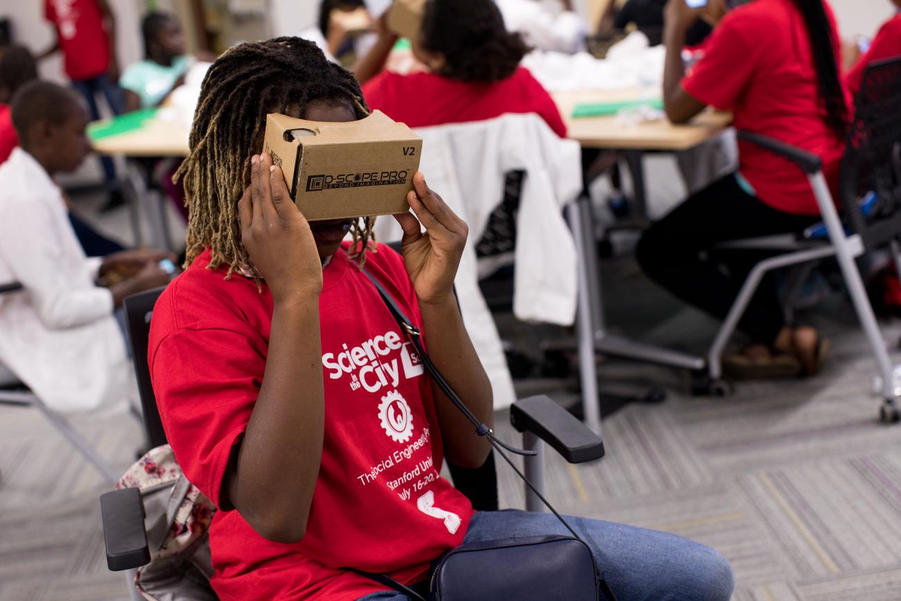Photo of kids using cardboard VR viewers